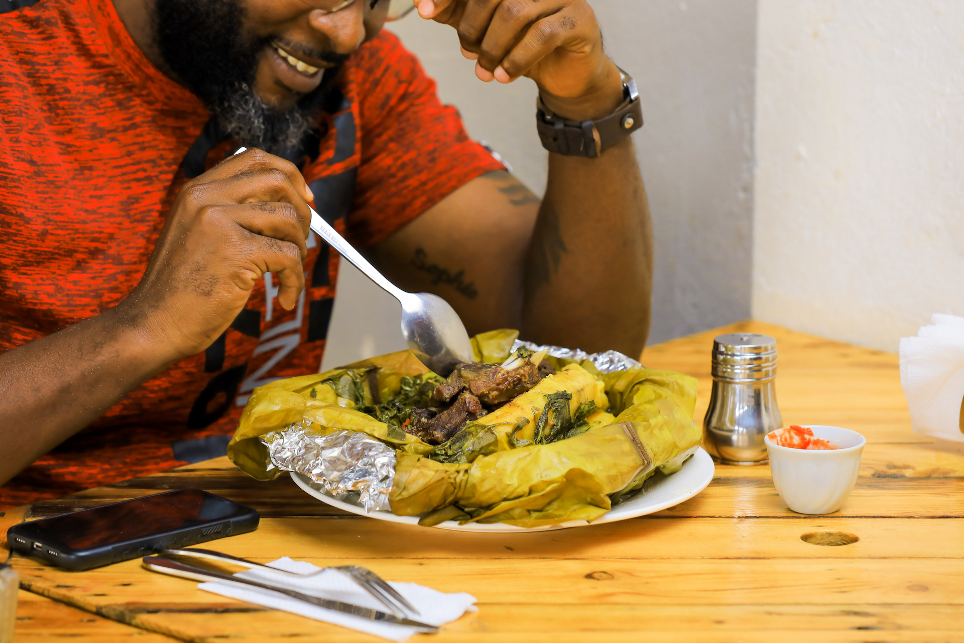 man at yaya eating